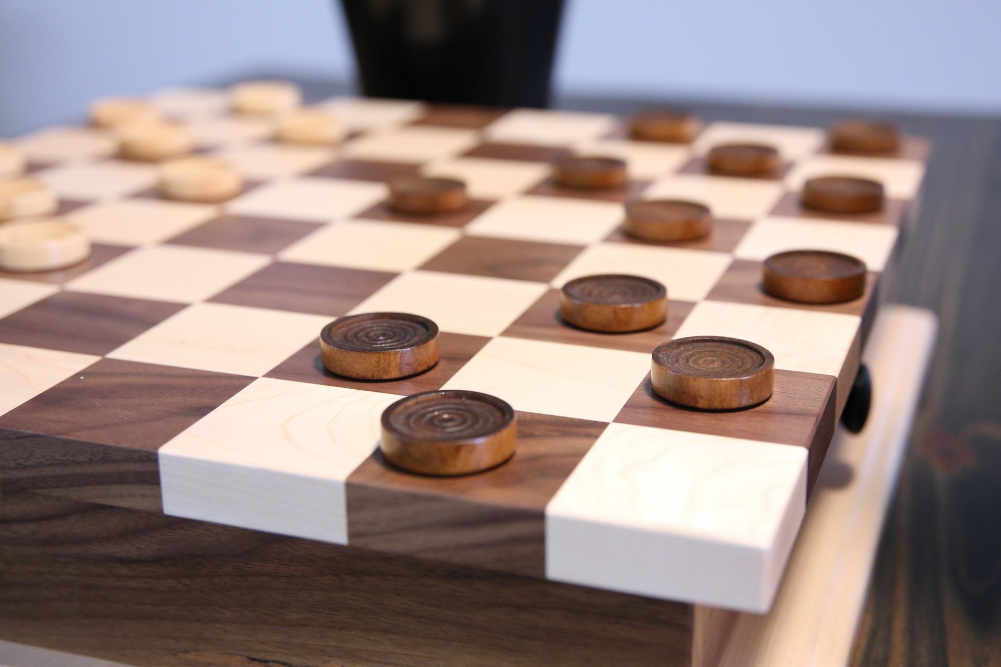 Wooden chess and checkers game board set with pullout drawer, featuring a smooth finish and classic design from AmishToyBox.com.