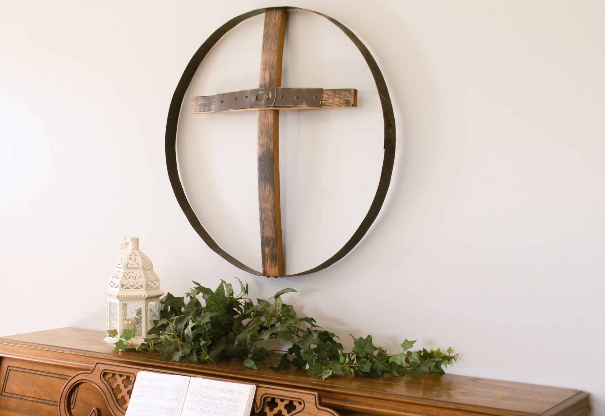 Rustic reclaimed barrel cross wall art, 23-inch diameter Amish-made religious wall decor with distressed wood finish.