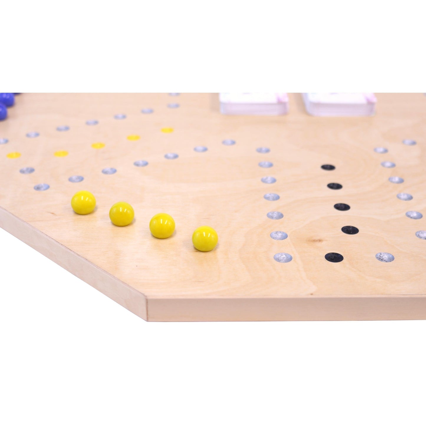 Wooden marble chase game set on a double-sided 23-inch wide board, featuring handcrafted wooden design and colorful marbles.