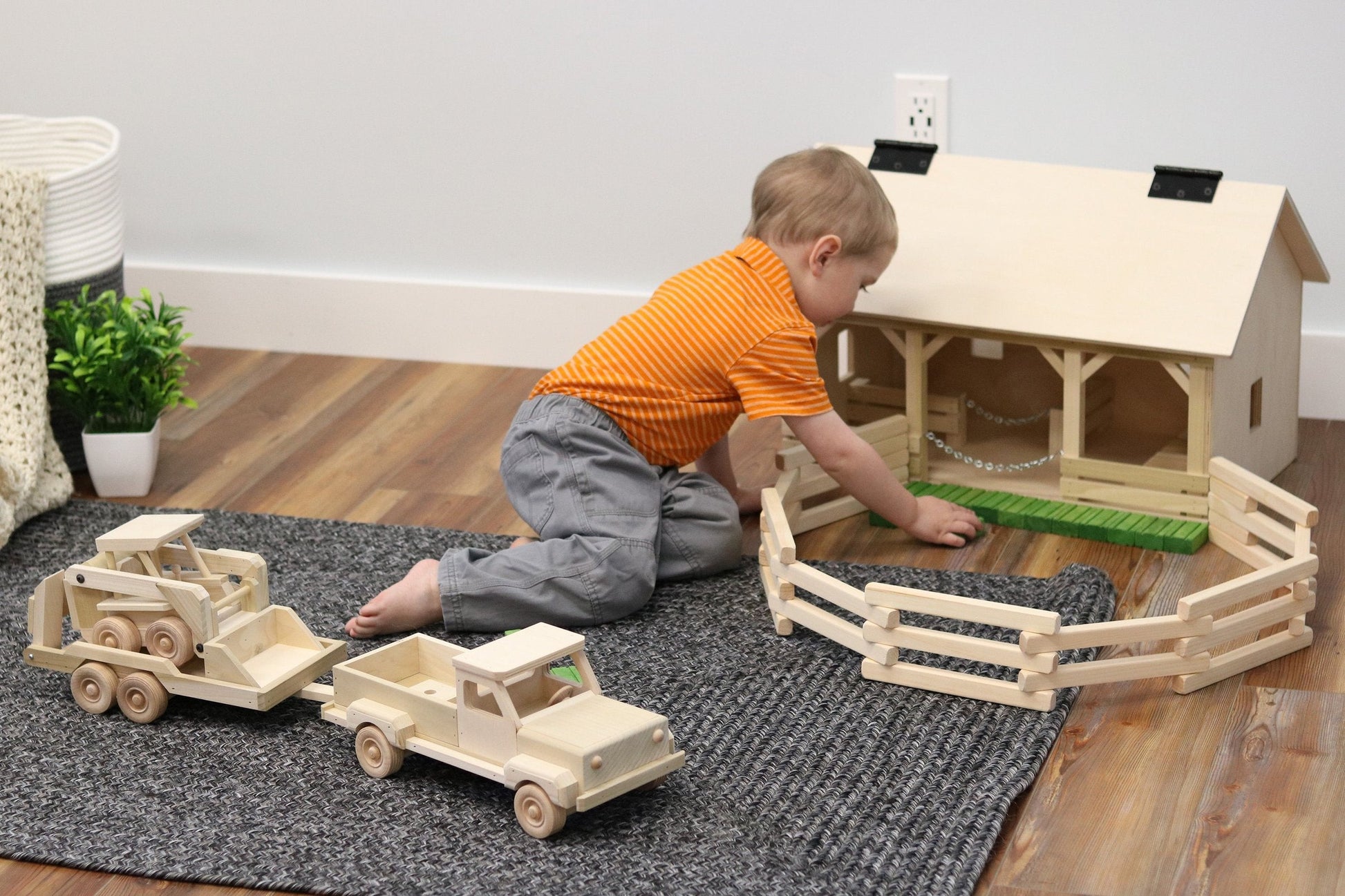 Wooden toy pickup truck and flatbed trailer with skidloader set, featuring detailed AmishToyBox.com wooden train and truck toys.