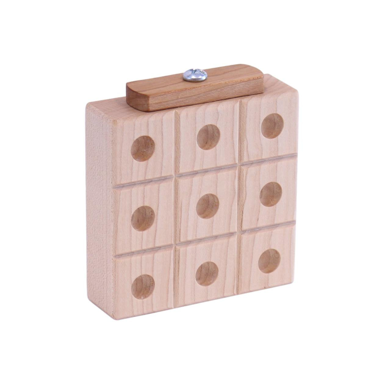 Wooden Tic Tac Toe game with marble storage, handcrafted AmishToyBox.com wooden toy for kids and family fun.