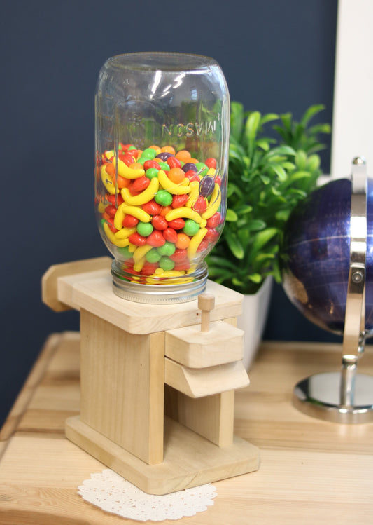 Toy jar candy dispenser from AmishToyBox.com, perfect for M&M's, peanuts, or jelly beans, with a clear viewing window.