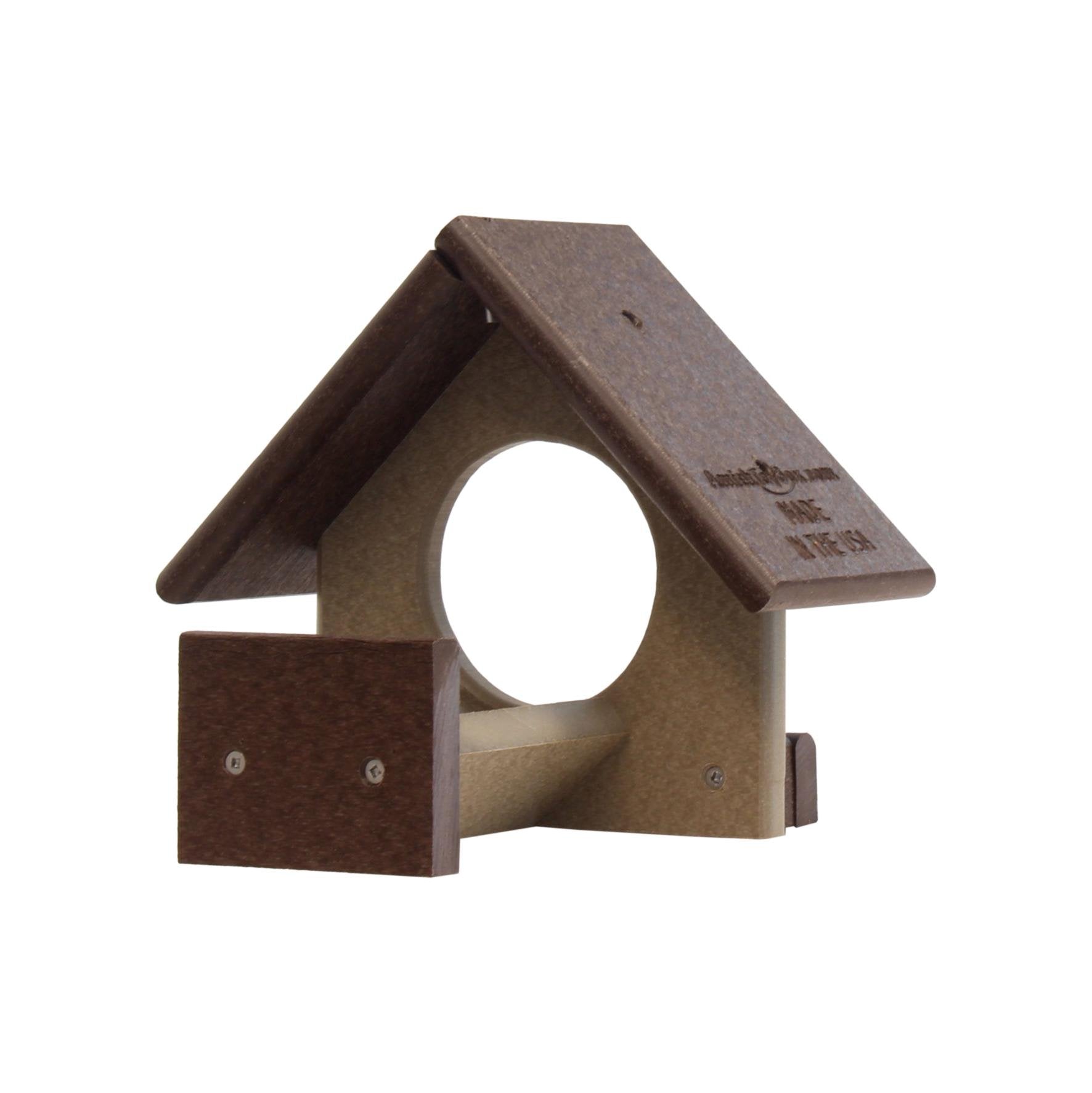 Amish-made peanut butter bird feeder designed for 18 oz. jars, with a wooden perch and clear feeding area for birds.