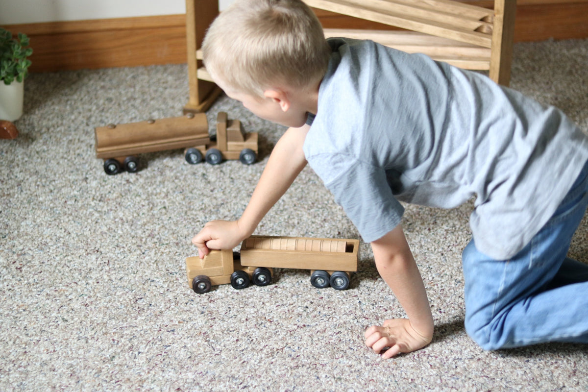 Wooden truck toy with removable barrels, AmishToyBox brand, child-safe harvest stain finish, part of wooden trains and trucks collection