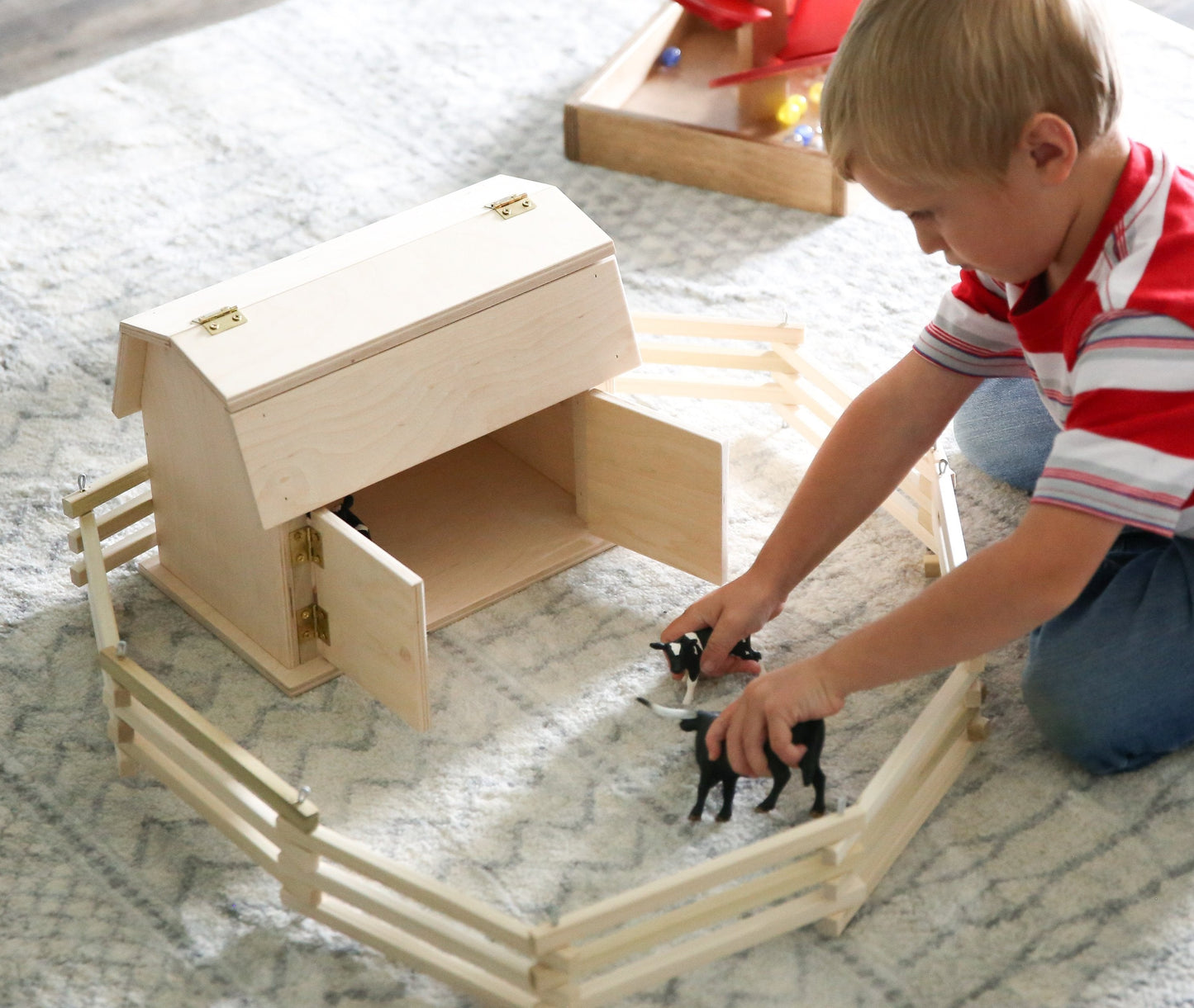 Amish-made mini wooden barn toy with hip roof design, ideal for children, crafted from natural wood by AmishToyBox.com