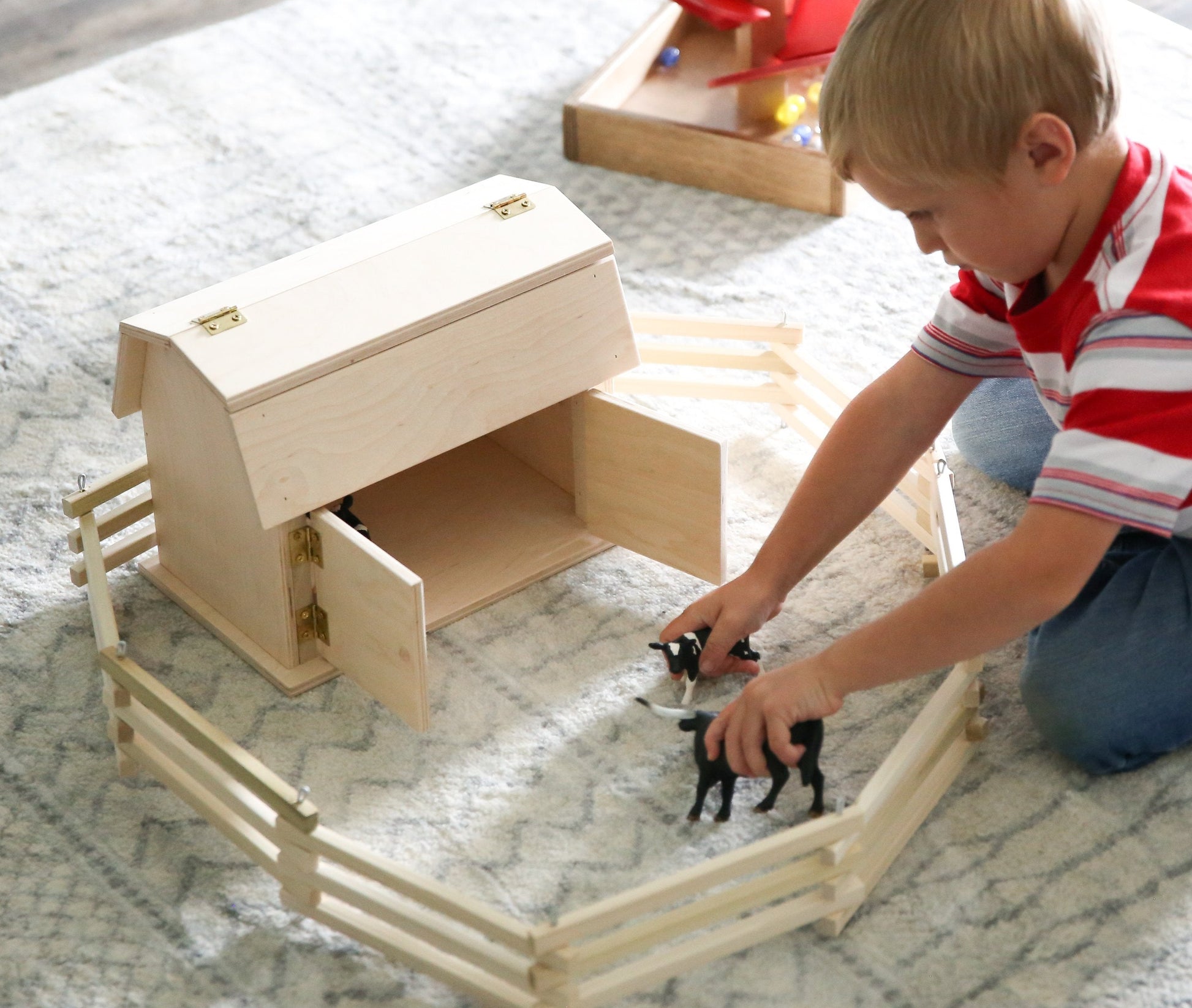 Amish-made mini wooden barn toy with hip roof design, ideal for children, crafted from natural wood by AmishToyBox.com