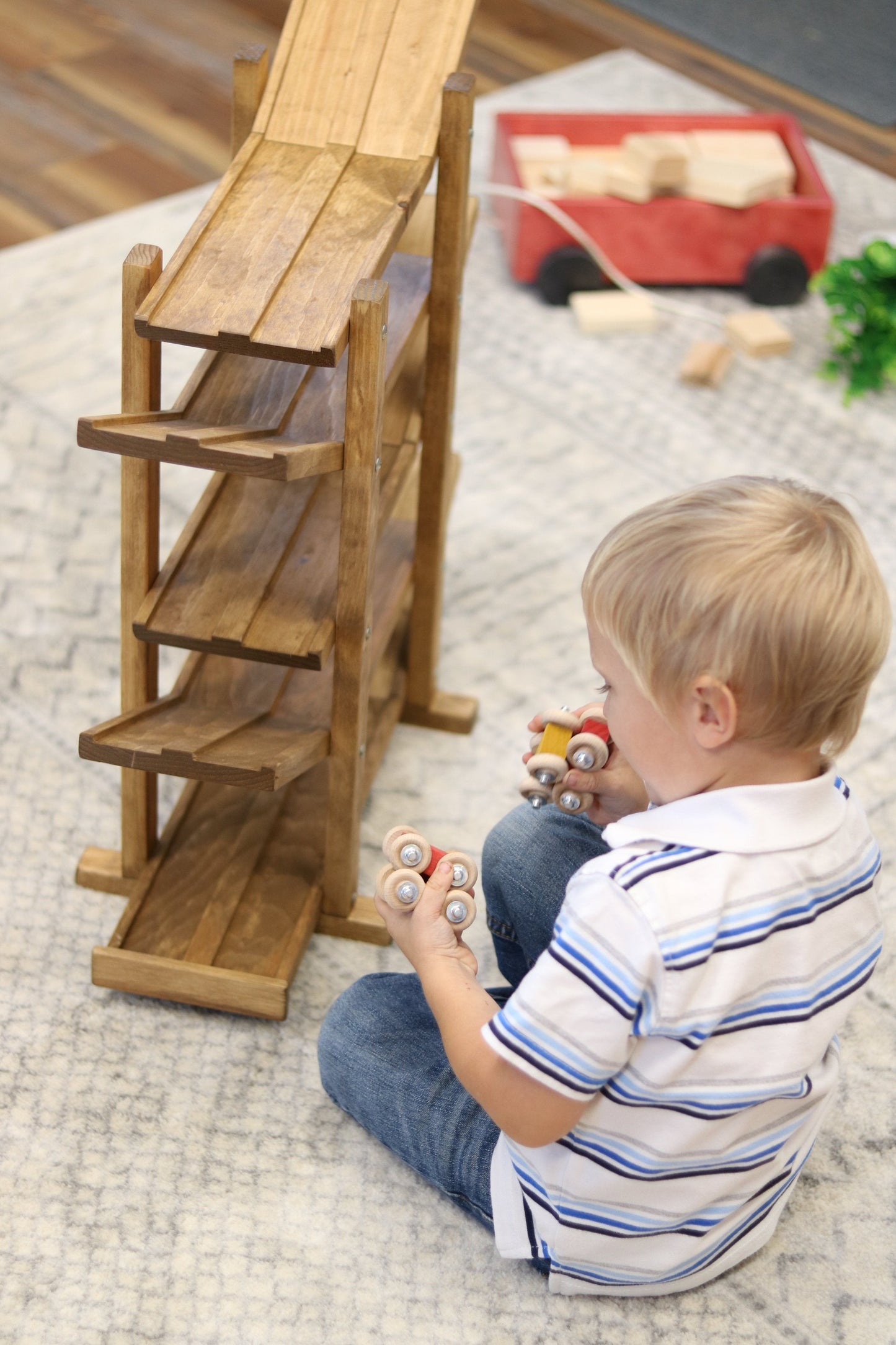 Amish-made handcrafted wooden marble and ball roller racetrack toy with colorful car rollers, designed for children’s play.