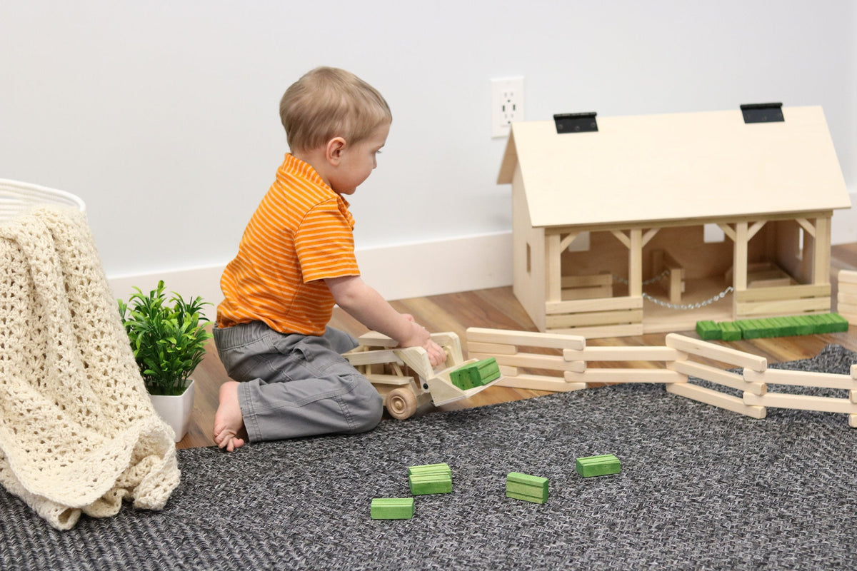 Wooden skid loader toy with movable bucket, AmishToyBox.com wooden toy for children, realistic skid steer construction vehicle.