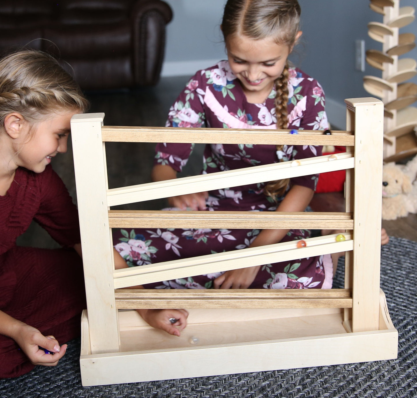 Amish-made heirloom marble and ball roller toy with wooden construction and child-safe finish, perfect for early play and sensory development.