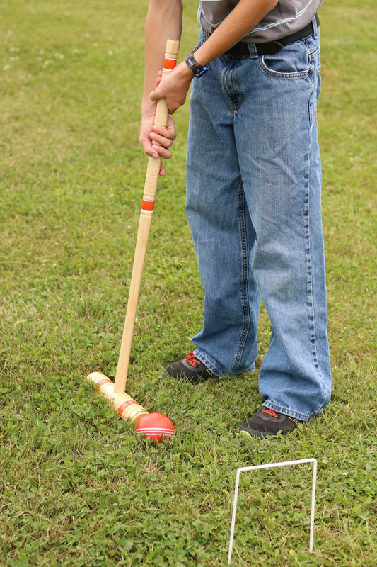 Amish-made Deluxe Croquet Game Set with wooden holder, designed for 6 players, includes colorful balls and mallets.
