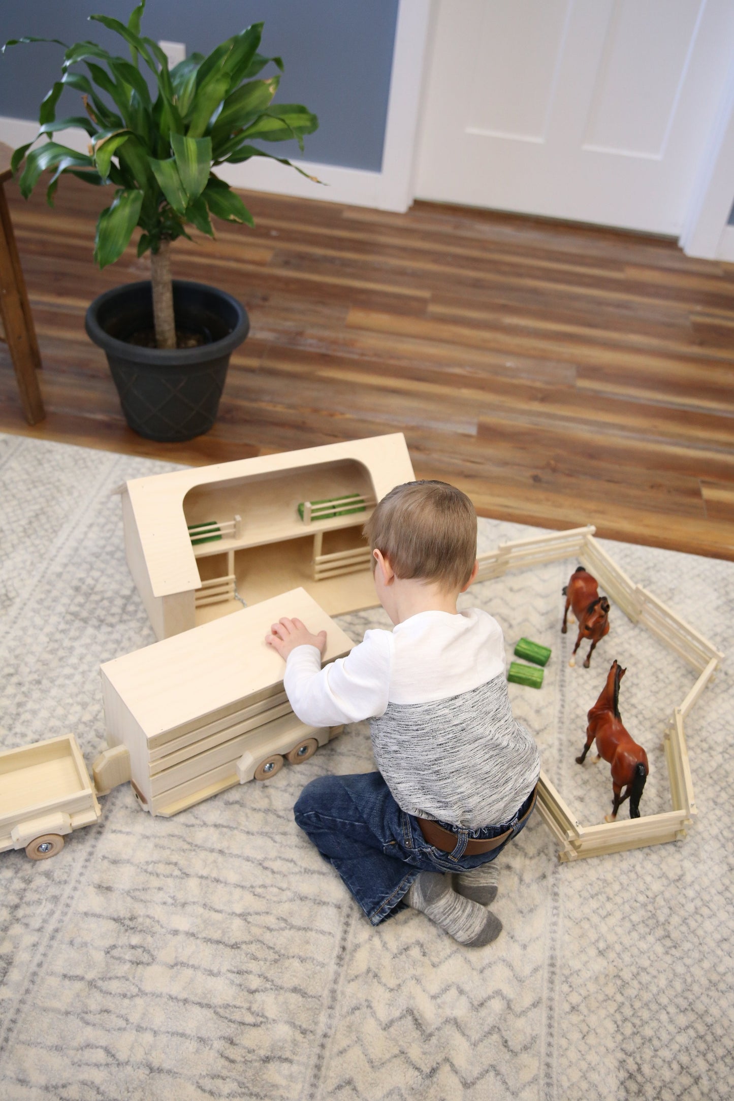 Unfinished wooden Amish-made ranch shed barn toy from AmishToyBox.com, designed for children’s farming play, made of natural wood.
