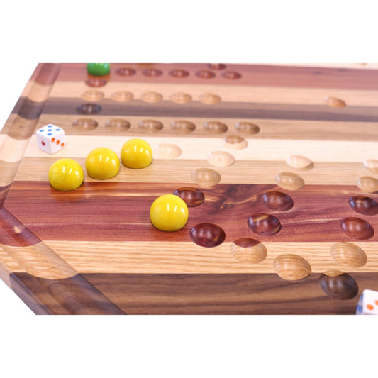 Multicolored wooden Aggravation marble game board set by AmishToyBox.com, 24-inch wide, with marbles and wooden game pieces.