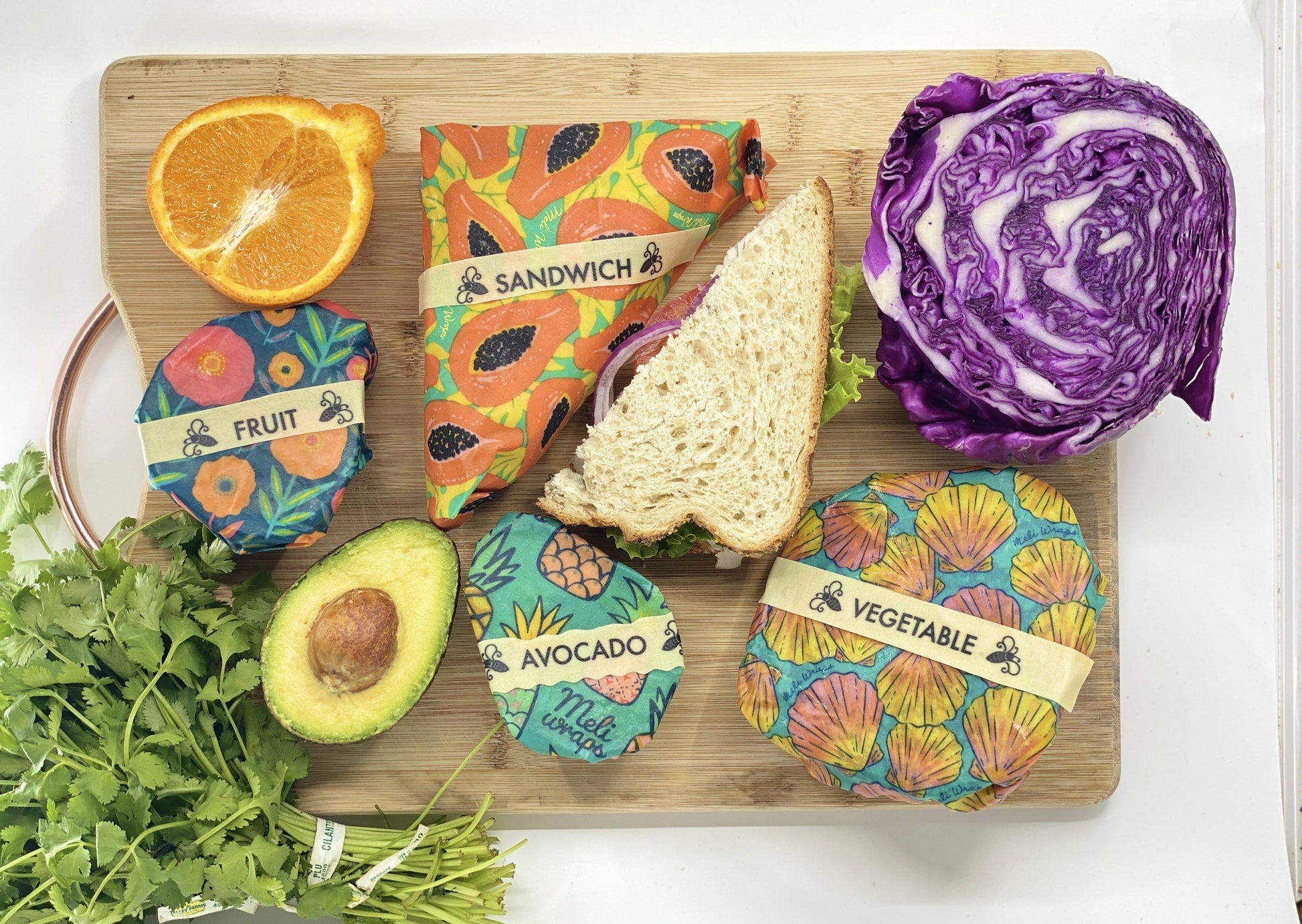 Meli Wraps Beeswax Wrap Food Labels with fun Buzz Words design, eco-friendly accessory for labeling food wraps.