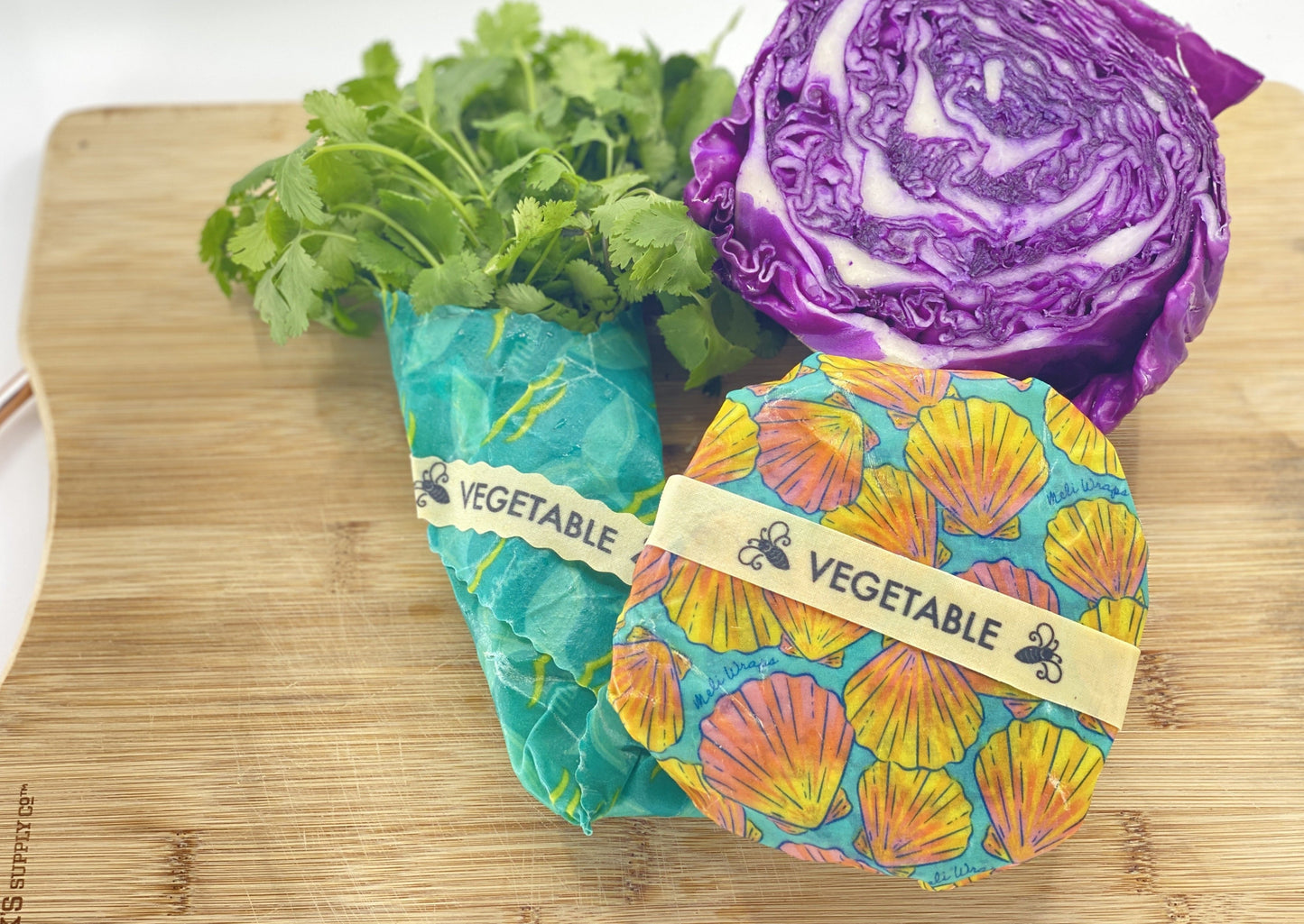 Meli Wraps beeswax wrap food labels with colorful "Buzz Words" design, accessory for organizing and labeling food wraps.