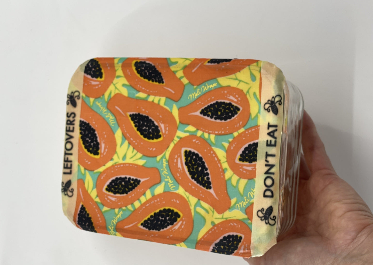 Meli Wraps Buzz Words Beeswax Wrap Food Labels accessory with colorful, eco-friendly label designs for food storage.