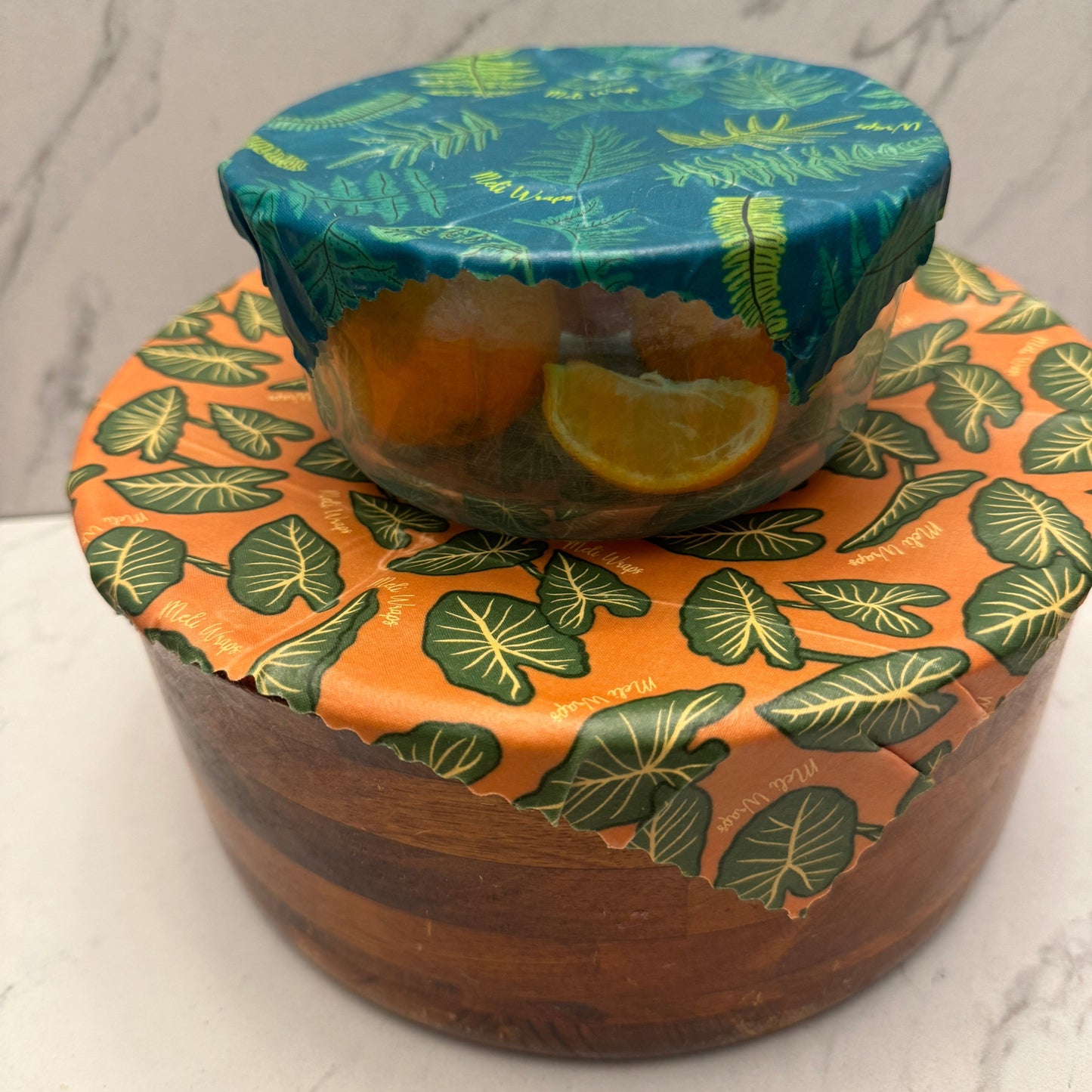 Meli Wraps beeswax roll with fern print in bulk, ideal for wrapping food and eco-friendly kitchen use.