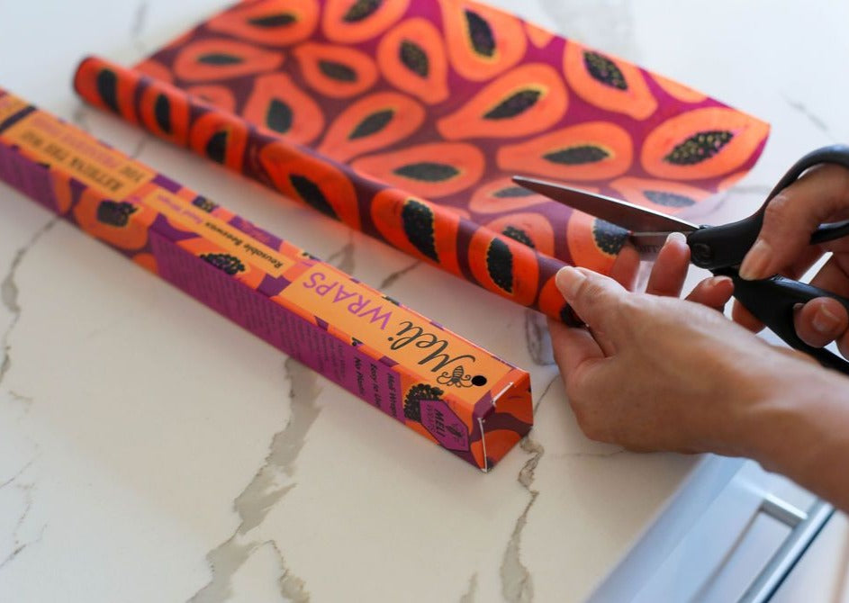 Meli Wraps beeswax roll in purple papaya print, natural beeswax wrap bulk roll for food storage and wrapping.