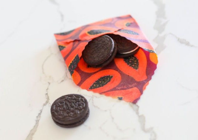 Beeswax Wrap Bulk Roll from Meli Wraps in purple papaya print, eco-friendly beeswax wraps for food storage.