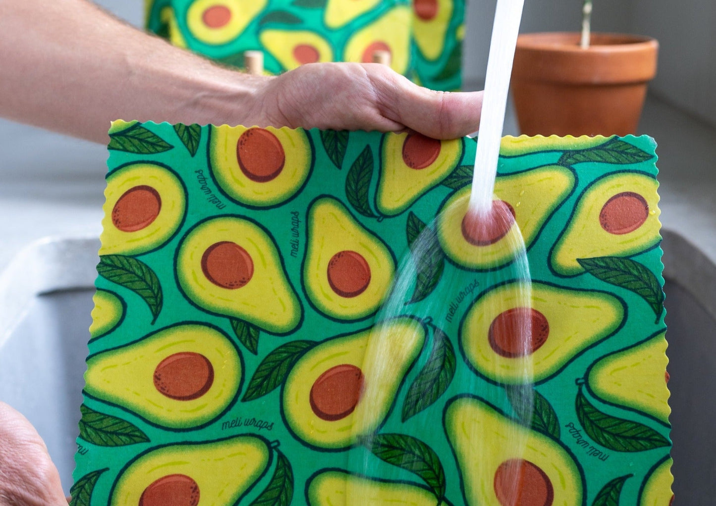 Bee wax food wraps by Meli Wraps in avocado print, shown in small, medium, and large sizes, designed for food storage.