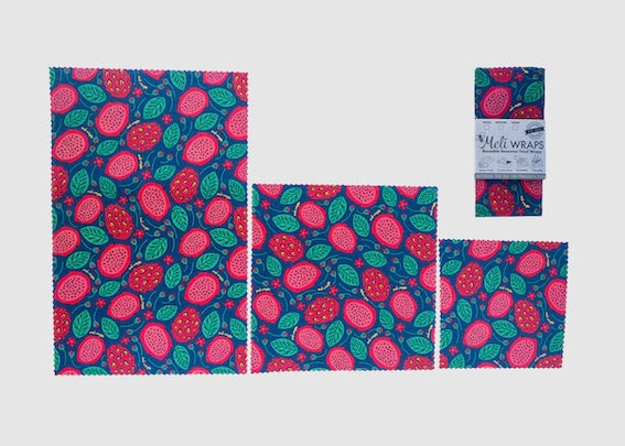 Set of Meli Wraps beeswax food wraps in small, medium, and large sizes with vibrant dragonfruit print, perfect for storing food naturally.