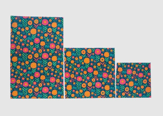 Set of Meli Wraps beeswax food wraps in fall bloom print, including small, medium, and large sizes for food storage.