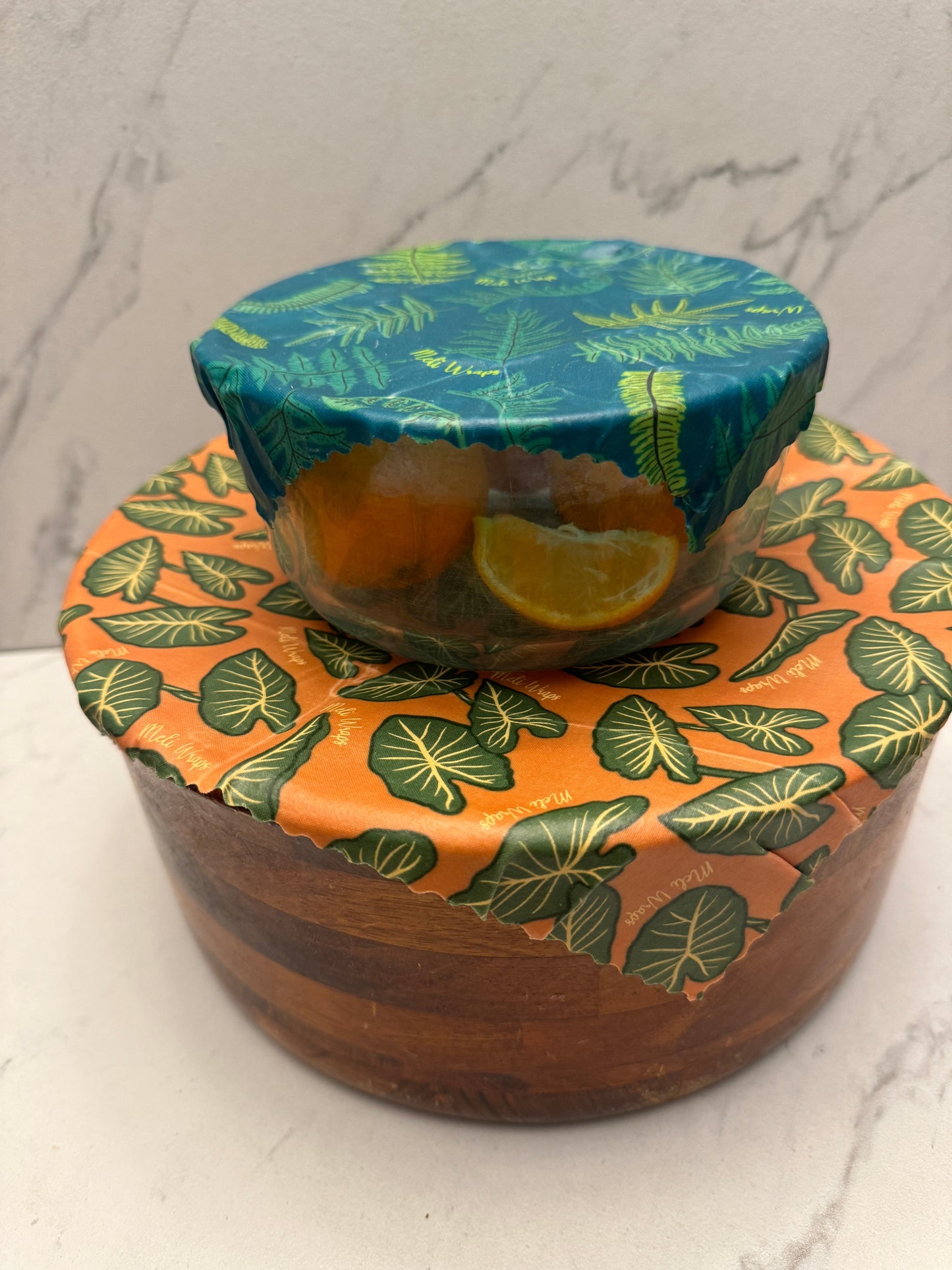 Set of Meli Wraps beeswax food wraps in fern print, small, medium, and large sizes, eco-friendly reusable food storage.
