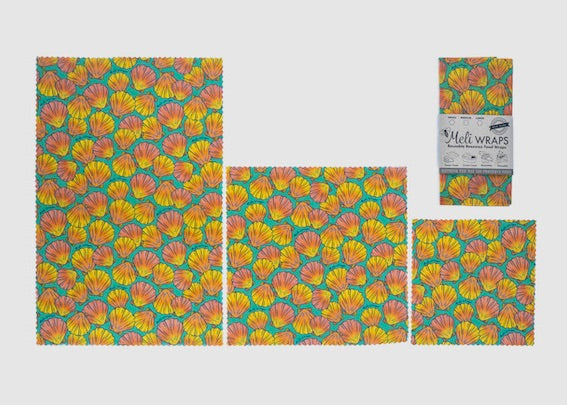 Set of Meli Wraps beeswax food wraps with sunrise shell print in small, medium, and large sizes for food storage.