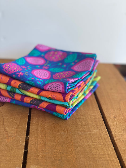 Set of two Dragonfruit cotton kitchen towels by Meli Wraps, featuring vibrant fruit print on soft, absorbent 100% cotton fabric.
