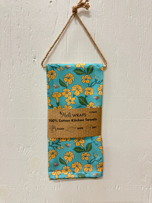 Set of 2 Puakenikeni and bee-themed kitchen towels by Meli Wraps, made of 100% cotton with colorful, detailed embroidery.