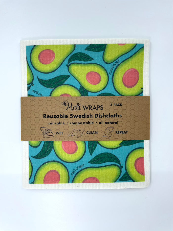 Set of three Meli Wraps Avocado Swedish dish cloths for kitchen use, featuring colorful avocado designs on absorbent cloths.
