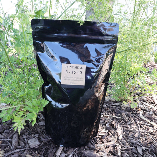 MIgardener 2lb bag of bone meal fertilizer, showing the labeled bag with product and brand information.
