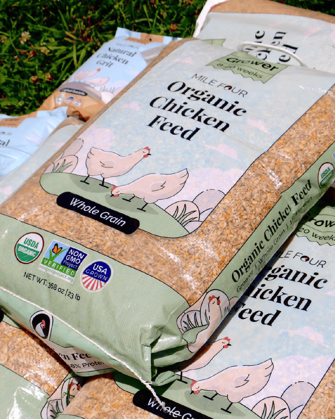 Organic chicken feed pellets by Mile Four, 2 lbs grower formula for healthy poultry nutrition.
