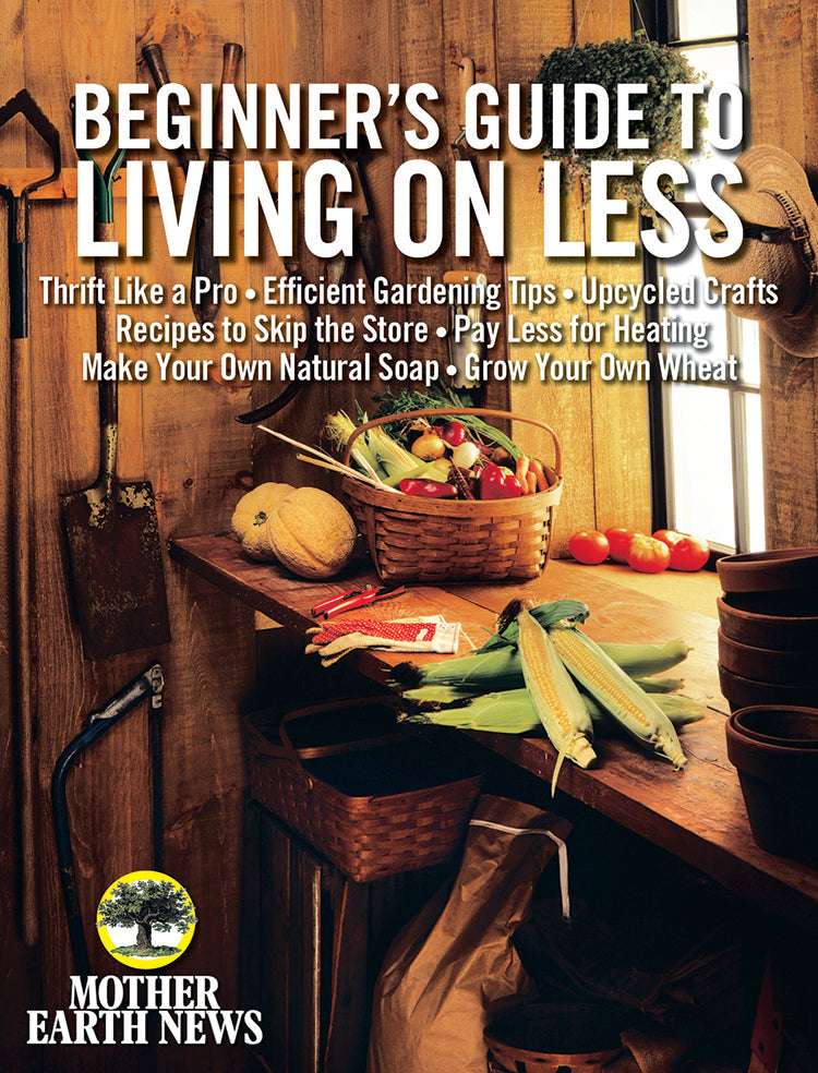 Cover of Mother Earth News Beginner's Guide to Living on Less book, featuring earthy tones and title text.