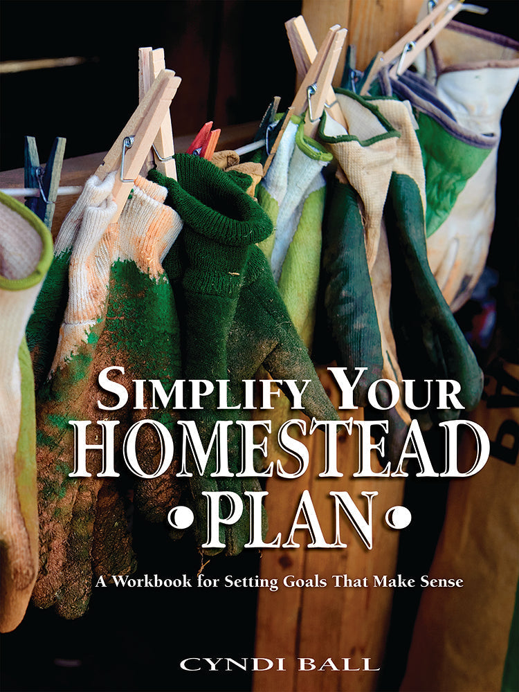 Mother Earth News book titled "Simplify Your Homestead Plan" with a cover featuring rustic farm imagery and greenery.