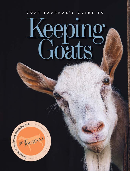 Mother Earth News paperback book titled "GOAT JOURNAL’S GUIDE TO KEEPING GOATS" with a cover image featuring goats and farm scenery.