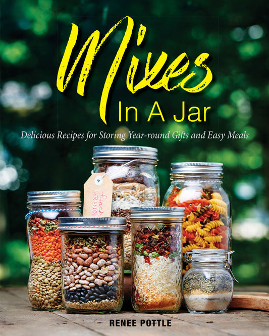Paperback book titled "Mixes in a Jar" by Mother Earth News, featuring colorful jar illustrations on the cover.