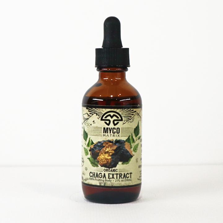 Mycomatrix CHAGA adaptogenic mushroom extract from Mushroom Mountain in a 2oz jar showing rich, dark Chaga mushroom pieces and labeling.