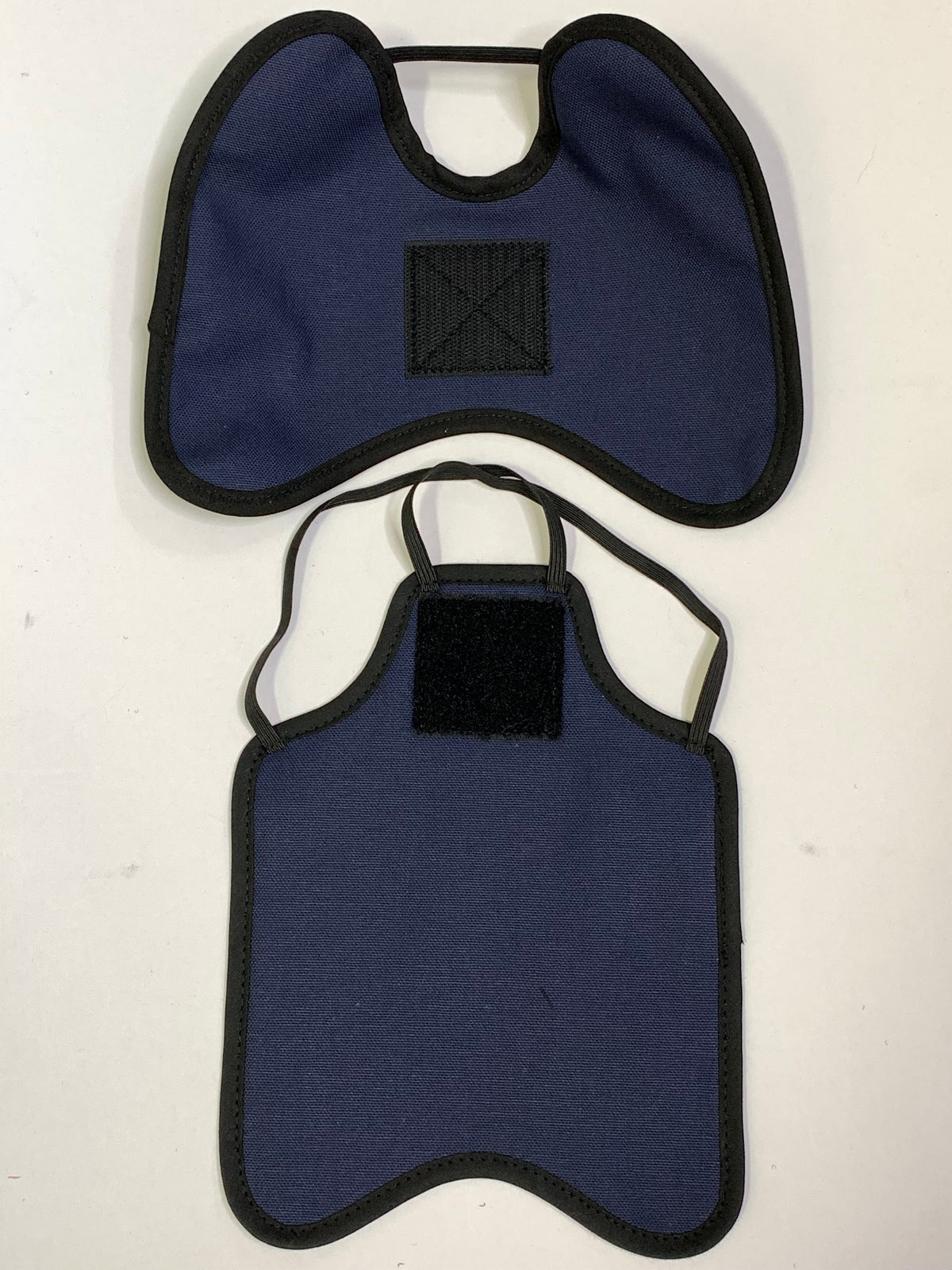 Navy hen apron with shoulder protectors by Crazy K Farm Pet and Poultry, designed to shield hens from rooster attacks.