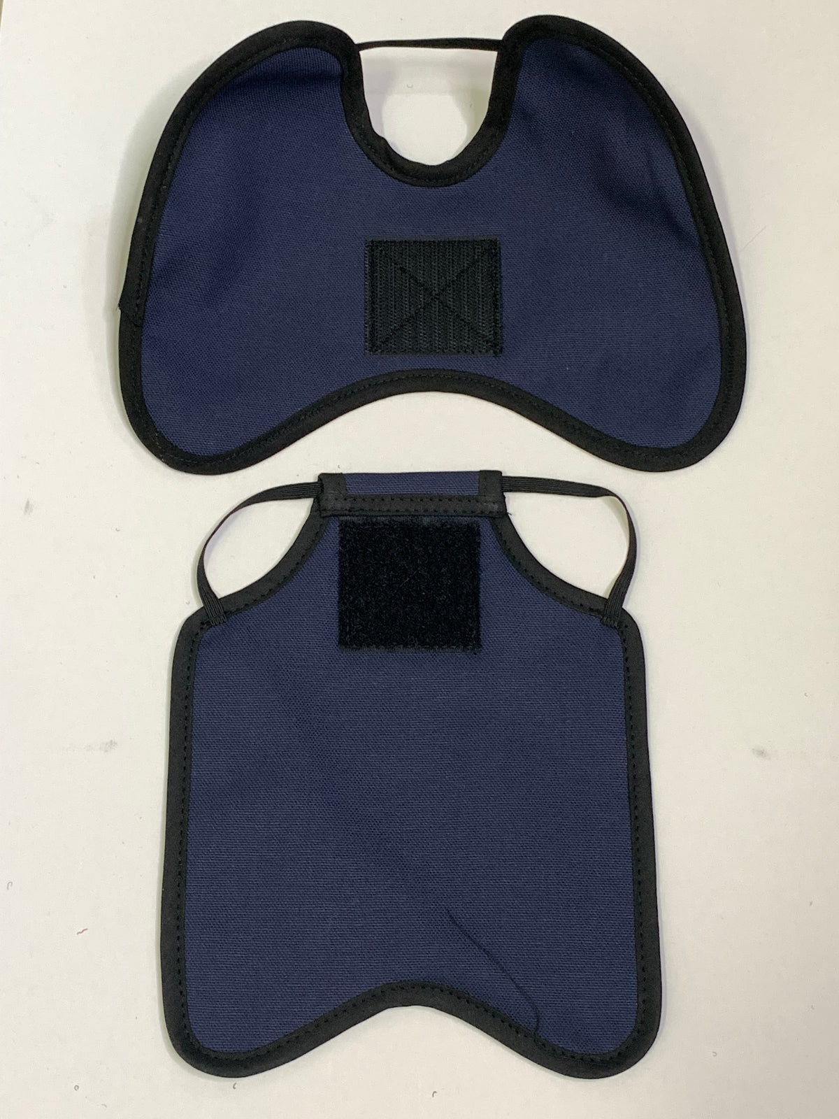 Navy hen saddle apron with shoulder protectors for hens, made by Crazy K Farm Pet and Poultry, designed to prevent feather damage.