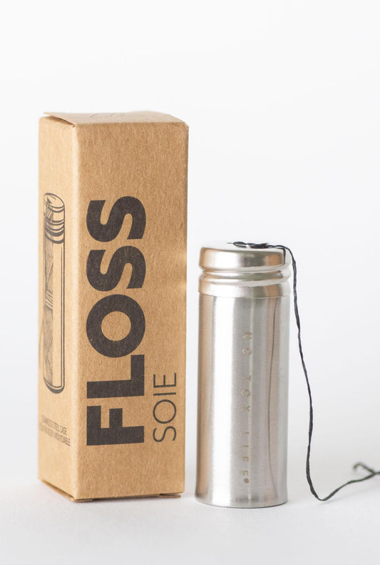 Charcoal floss in stainless steel holder by NO TOX LIFE, eco-friendly dental floss for oral hygiene.