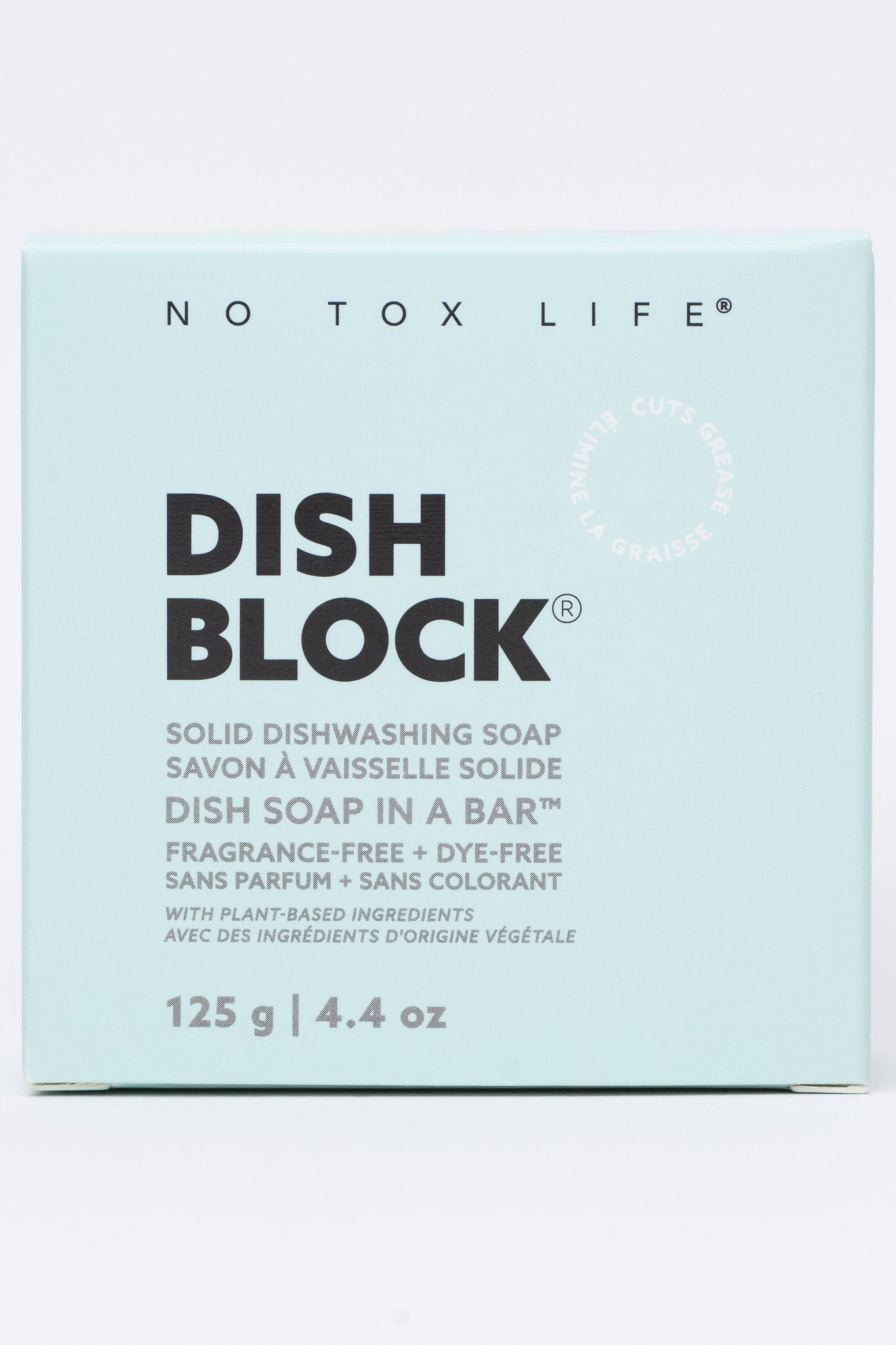 DISH BLOCK® solid dish soap bar by NO TOX LIFE, fragrance-free, 4.4 oz (125g), in clear packaging on a kitchen counter