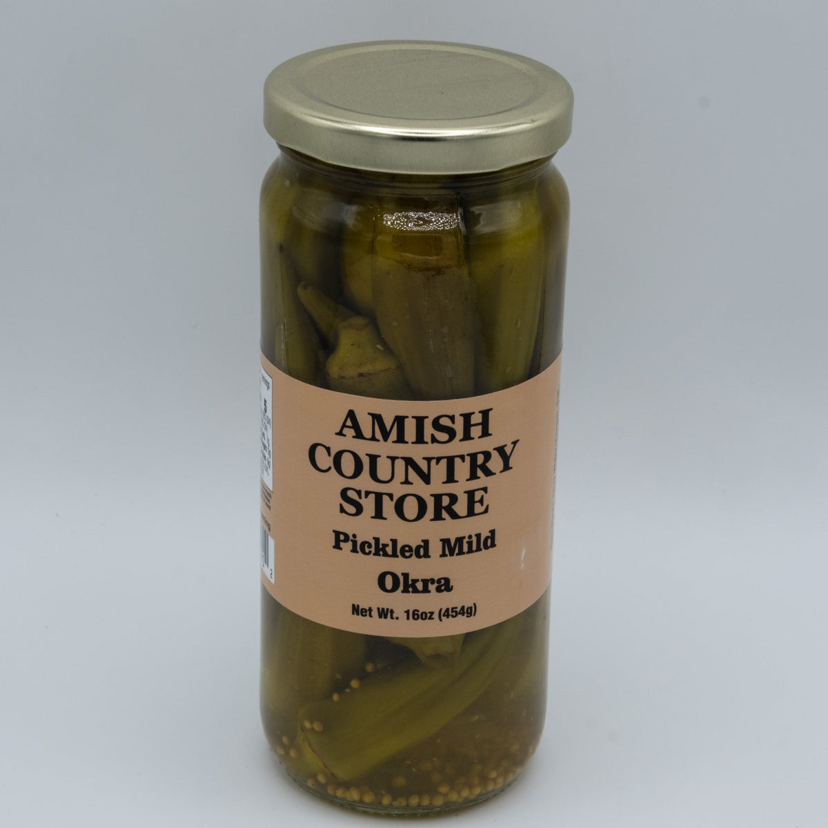 Jar of Amish Country Store pickled mild okra in a 16oz jar, showing fresh green okra spears submerged in pickling brine.