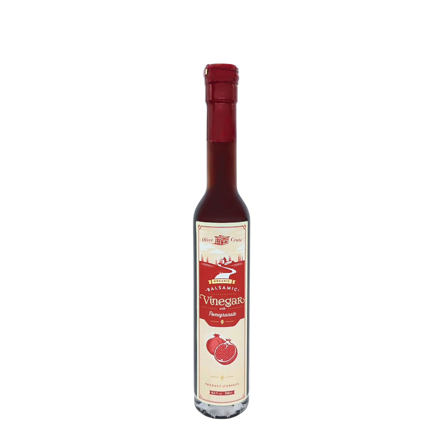Bottle of Olive Crate 100% Organic Balsamic Vinegar with Pomegranate, dark and rich with pomegranate infusion, on a wooden surface.