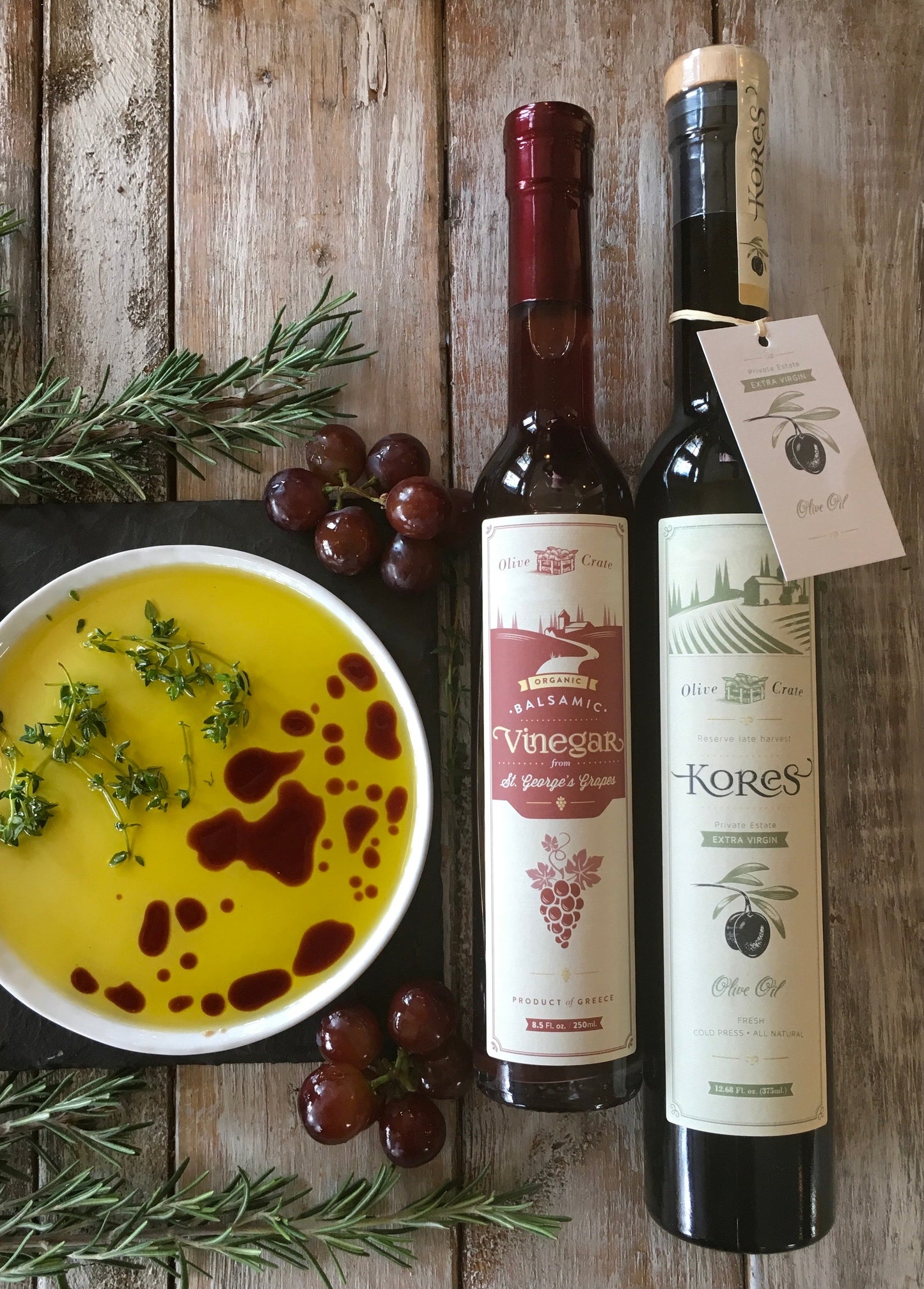 Organic balsamic vinegar from St. George's grapes by Olive Crate, featuring a dark, glossy liquid in a glass bottle.