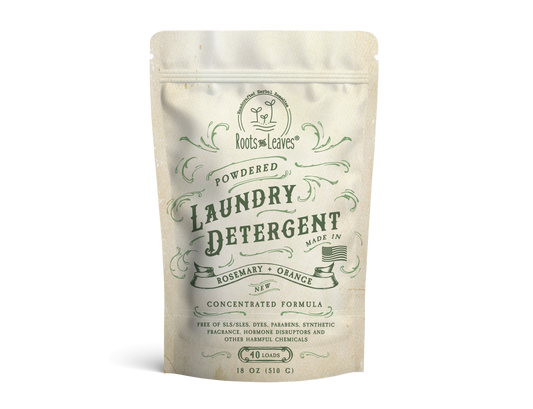 Natural powdered laundry detergent with orange and rosemary scent from Roots and Leaves LLC, showing the orange and rosemary ingredients.