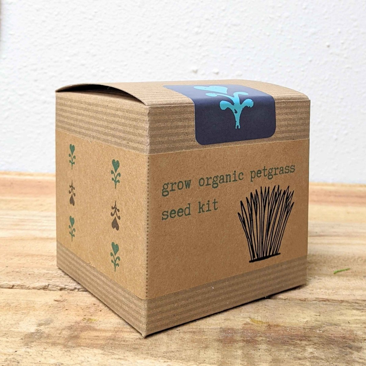 Organic Petgrass Grow Kit with sprouting seeds by Plantflix, showing lush green petgrass ready for pets to enjoy.