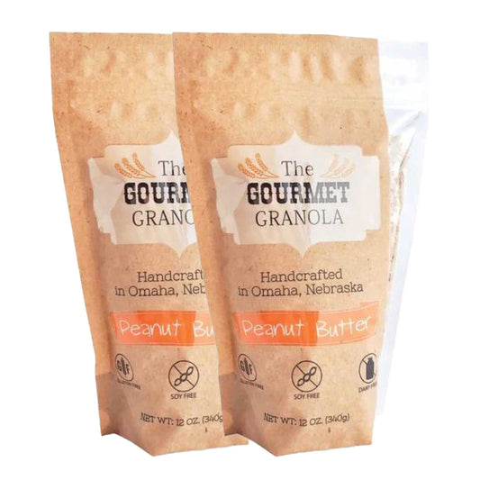 Pack of two 12 oz gluten, soy, and dairy-free peanut butter granola by The Gourmet Granola, displayed in a clear bowl with nuts.