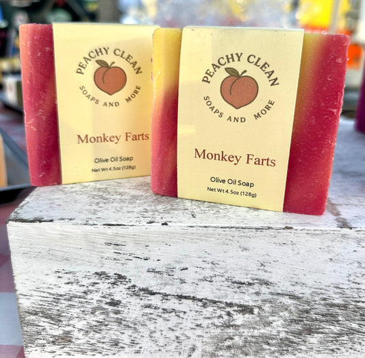 Handcrafted soap bar labeled Monkey Farts by Peachy Clean Soaps and More LLC, featuring colorful, playful packaging and vibrant design.