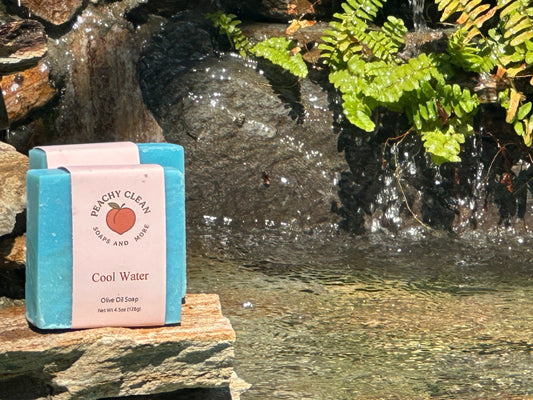 Bar of Peachy Clean Soaps and More LLC Cool Water soap with a clean, refreshing design and blue packaging.