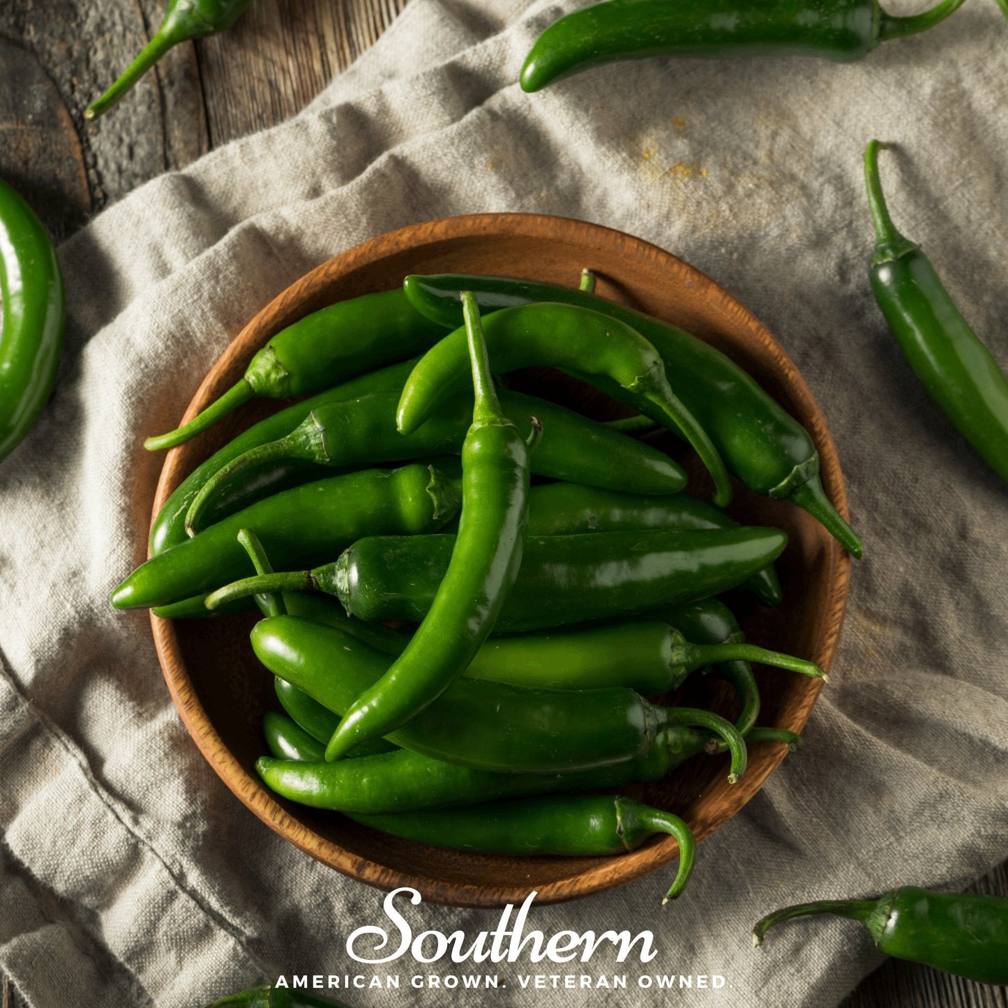 Serrano pepper plant with green peppers, 25 seeds from Southern Seeds for growing hot capsicum peppers.